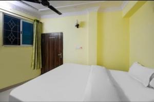 Ένα ή περισσότερα κρεβάτια σε δωμάτιο στο Rinchen Stay