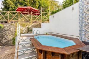 Bazén v ubytování Gîte de la Poste nebo v jeho okolí