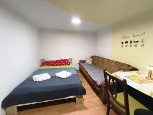 Postel nebo postele na pokoji v ubytování Heli budget condo