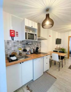 Η κουζίνα ή μικρή κουζίνα στο Scape House