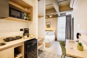 Η κουζίνα ή μικρή κουζίνα στο Hotel Attic 33