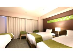 Postel nebo postele na pokoji v ubytování Smile Hotel Premium Kanazawa Higashiguchi Ekimae - Vacation STAY 73599v + 31 fotografií