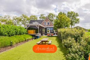 a home with a gazebo in the yard at Amsterdam Group Villa 20 plus beds 4 - 5 bedrooms in Zwanenburg
