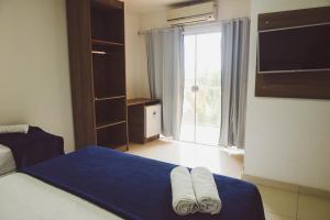 Postel nebo postele na pokoji v ubytování Pousada Xerxes + 75 fotografií