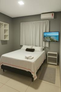 Postel nebo postele na pokoji v ubytování Varandas Hotel