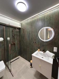 Ένα μπάνιο στο Apartamenty Południowa