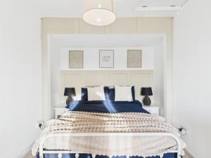 En eller flere senge i et værelse på Riviera Cottage - Cornwall