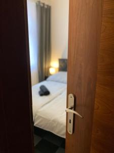 Giường trong phòng chung tại Hotel Central