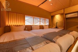 Postel nebo postele na pokoji v ubytování Kyoran [Yatsutsuki Residence] - Vacation STAY 69010v