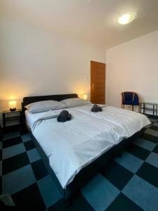 Ένα ή περισσότερα κρεβάτια σε δωμάτιο στο Hotel Central