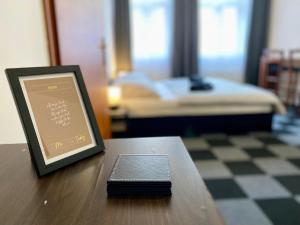 Ένα ή περισσότερα κρεβάτια σε δωμάτιο στο Hotel Central +28 φωτογραφίες