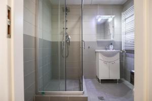 Koupelna v ubytování Mures Stay Condo + 7 fotografií