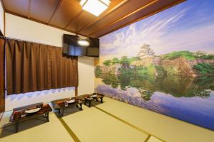 Televiisor ja/või meelelahutuskeskus majutusasutuses Ashigarashimogun - Apartment - Vacation STAY 74954v