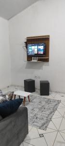 TV a/nebo společenská místnost v ubytování Casa Leal