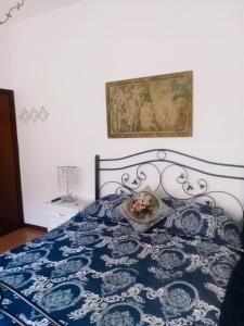 Ένα ή περισσότερα κρεβάτια σε δωμάτιο στο Villa Rosa