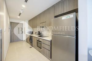 Η κουζίνα ή μικρή κουζίνα στο Bloomfields Cozy StuYas Golf Collection