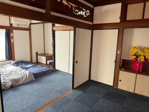 Voodi või voodid majutusasutuse Kuu-chan no Ie - Vacation STAY 77676v toas