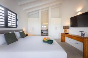 Postel nebo postele na pokoji v ubytování Villa Gurbe 801