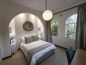 Ένα ή περισσότερα κρεβάτια σε δωμάτιο στο The Bardolino Artists Retreat