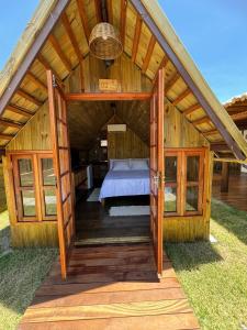 Postel nebo postele na pokoji v ubytování Vila Tibá Pousada