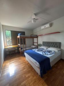 Ένα ή περισσότερα κρεβάτια σε δωμάτιο στο Da Orla Pampulha Hostel +66 φωτογραφίες