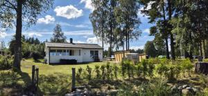 Κήπος έξω από το vänerstugan