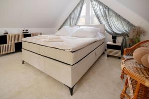 Voodi või voodid majutusasutuse Domek w Lelewie toas