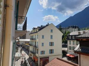 a view of a city from a building at Appartement Paccard, Centre Ville in Chamonix-Mont-Blanc +9 photos