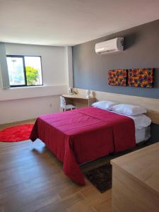 Ένα ή περισσότερα κρεβάτια σε δωμάτιο στο Carambola CoLiving