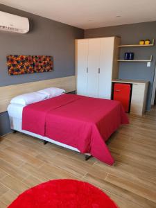 Ένα ή περισσότερα κρεβάτια σε δωμάτιο στο Carambola CoLiving +17 φωτογραφίες