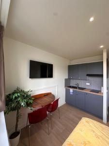 Η κουζίνα ή μικρή κουζίνα στο La perle nocturne