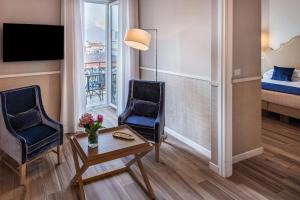 Giường trong phòng chung tại Starhotels Terminus