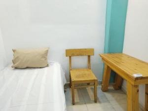 En eller flere senge i et værelse på cozy room4 Hurgada