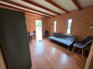 Postel nebo postele na pokoji v ubytování Cabaña Playa Chauquen 2