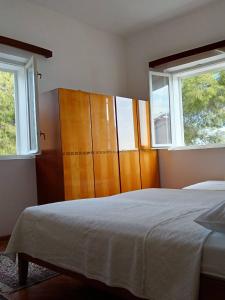 Ένα ή περισσότερα κρεβάτια σε δωμάτιο στο Apartment Jadris