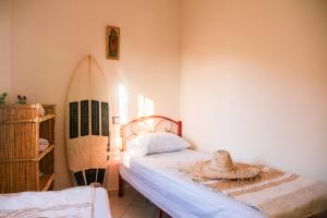 Ένα ή περισσότερα κρεβάτια σε δωμάτιο στο Surf Away Morocco