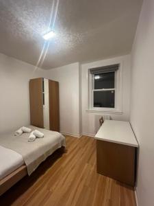 En eller flere senge i et værelse på Edinburgh Centre - Richmond Residence