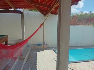 Bazén v ubytování Chácara silva nebo v jeho okolí