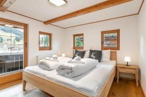 Postel nebo postele na pokoji v ubytování Kast'l Apartments