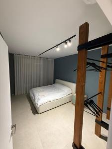 Postel nebo postele na pokoji v ubytování Casa JV