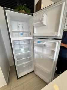 Η κουζίνα ή μικρή κουζίνα στο Spacious Apartment in the Laureles neighborhood