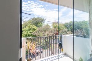 a view from the balcony of a house at Calido 1BR Dpto, a minutos del Aeropuerto in Asuncion