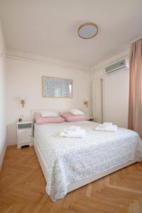 Ένα ή περισσότερα κρεβάτια σε δωμάτιο στο NookLite Studio near Belgrade Arena