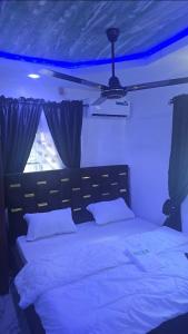 Ένα ή περισσότερα κρεβάτια σε δωμάτιο στο Hotel de mexico