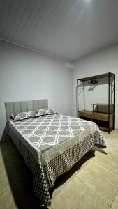 Postel nebo postele na pokoji v ubytování Casa das Hortênsias