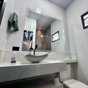 Koupelna v ubytování Casa das Hortênsias