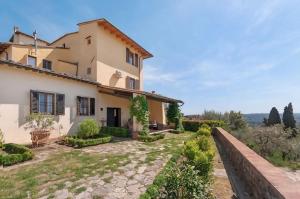 Villa con vistas al jardín en Villa Ridente - Elegance and views of Florence, en Settignano