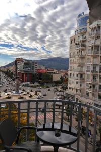 a view of a city from a balcony at Horizont Apart-Hotel in Shkodër