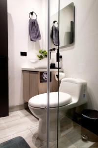 Koupelna v ubytování Apartment suite Encanto de Caldas + 27 fotografií