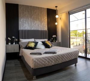 Postel nebo postele na pokoji v ubytování Apartment suite Encanto de Caldas